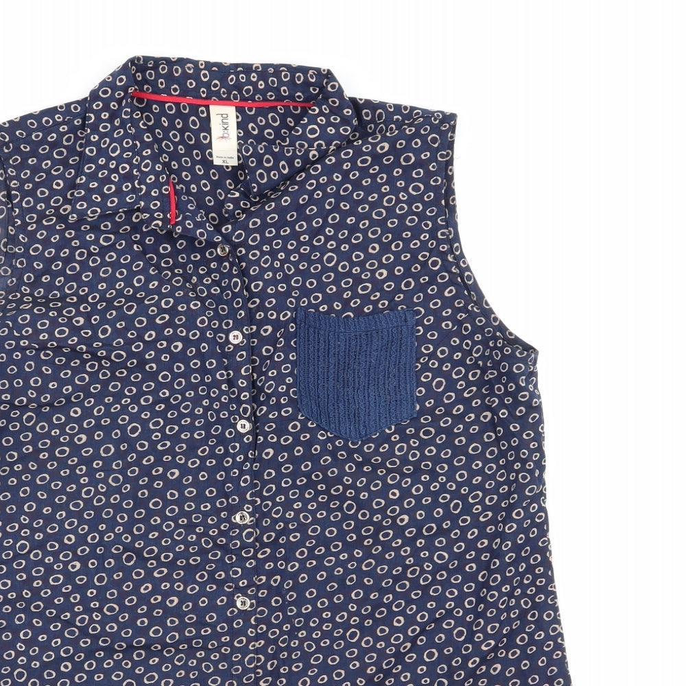 Close-up detail of kind women’s blue geometric basic button-up, size XL