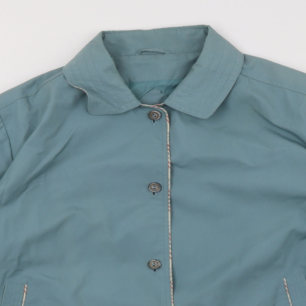 Close-up detail of david berry women’s blue jacket, size UK 18