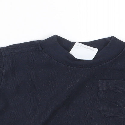 Close-up detail of Preworn boys’ blue basic t-shirt, size 6-9, months