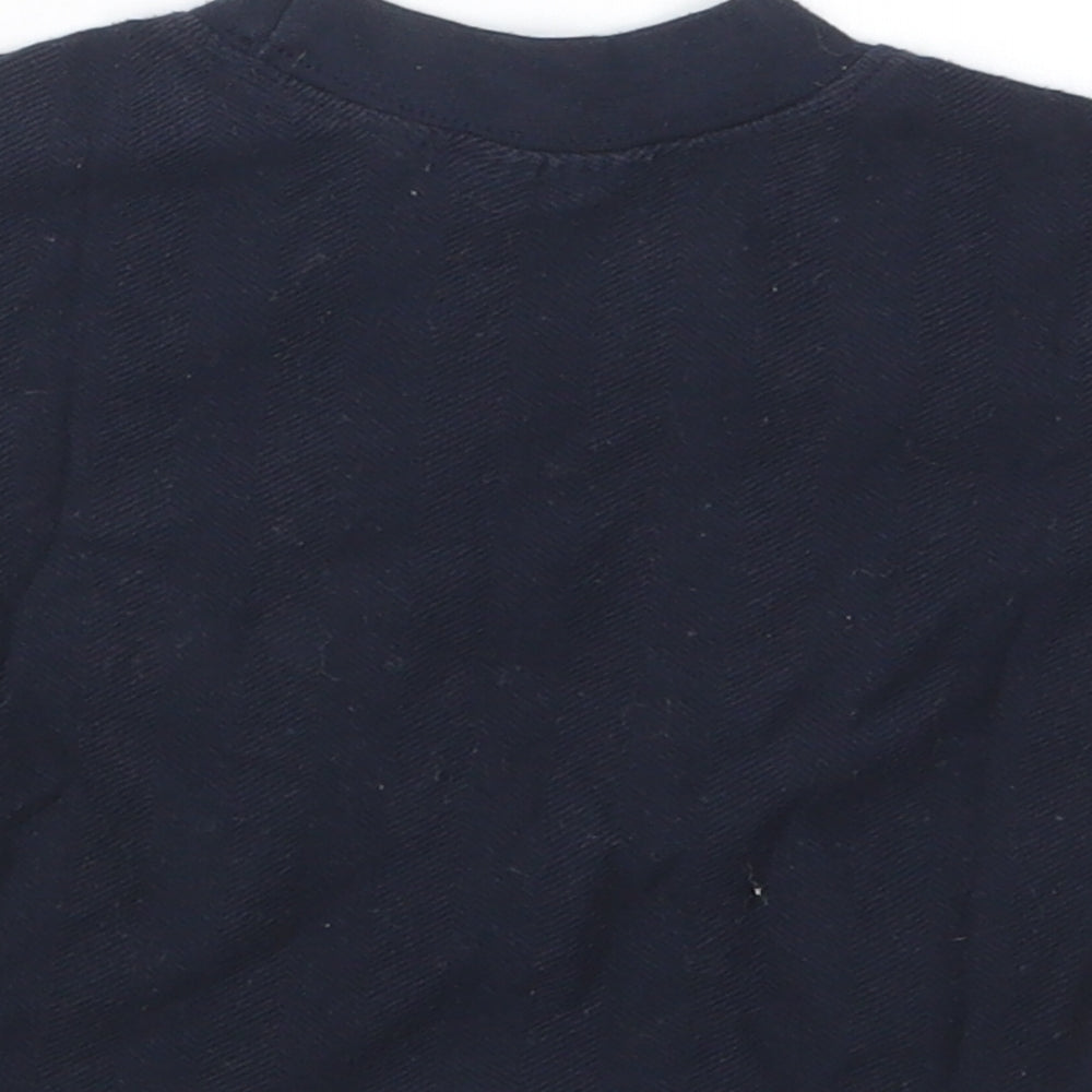 Brand and care label for Preworn boys’ blue basic t-shirt, size 6-9, months