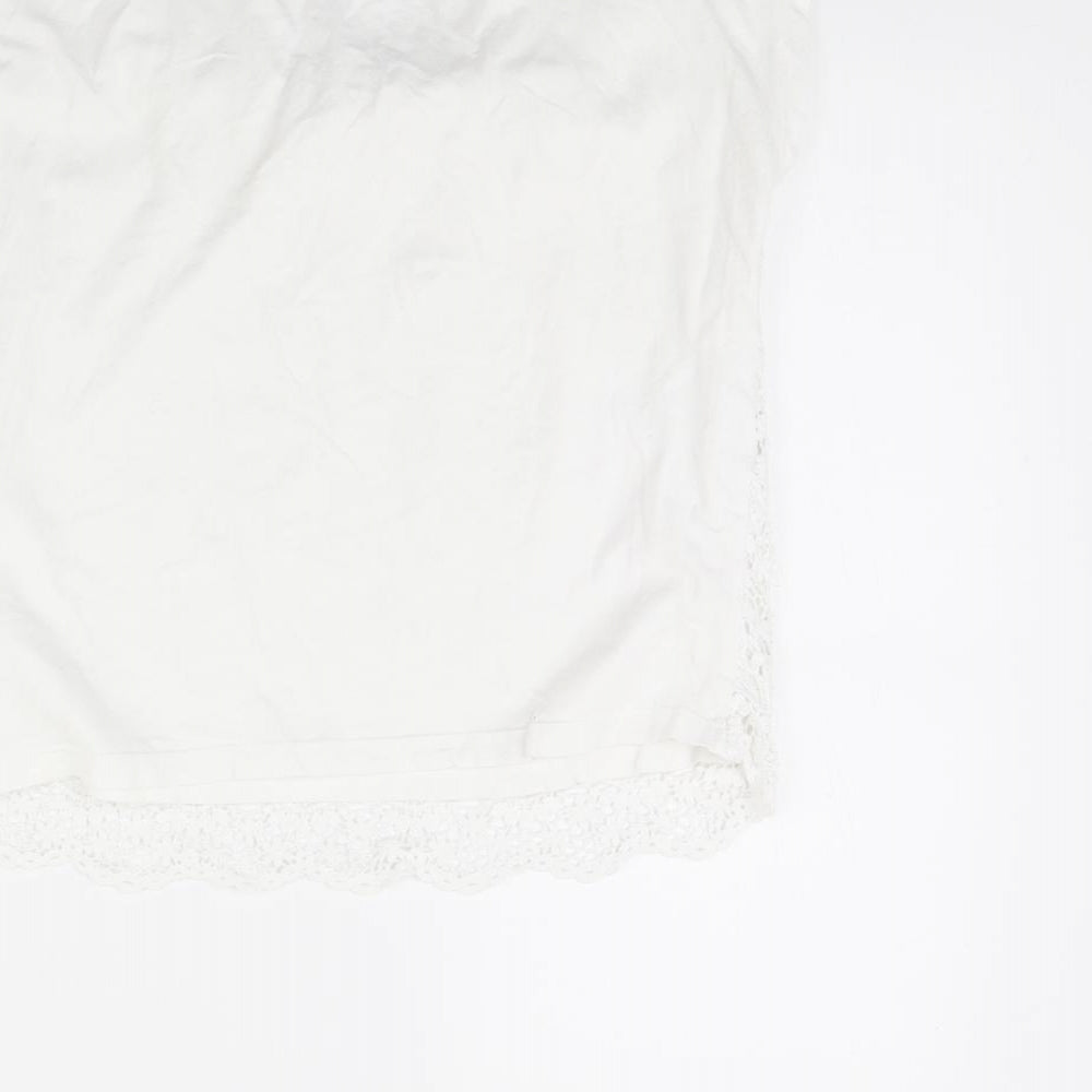 Brand and care label for YD girls’ white basic t-shirt, size 12, years