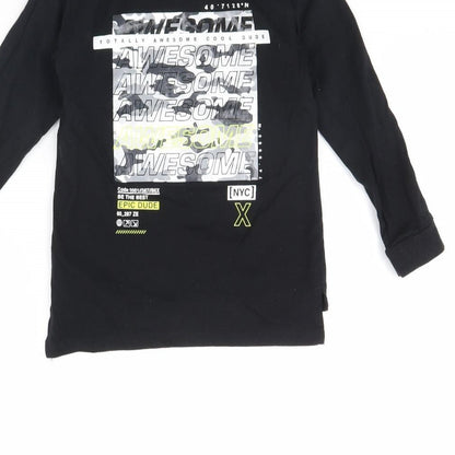 Brand and care label for Primark boys’ black basic t-shirt, size 4, years