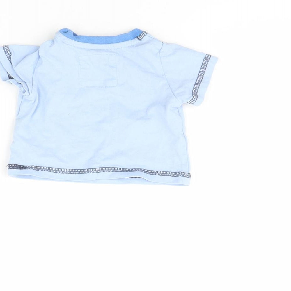 Brand and care label for Tu girls’ blue basic t-shirt, size 0-3, months - tiny baby