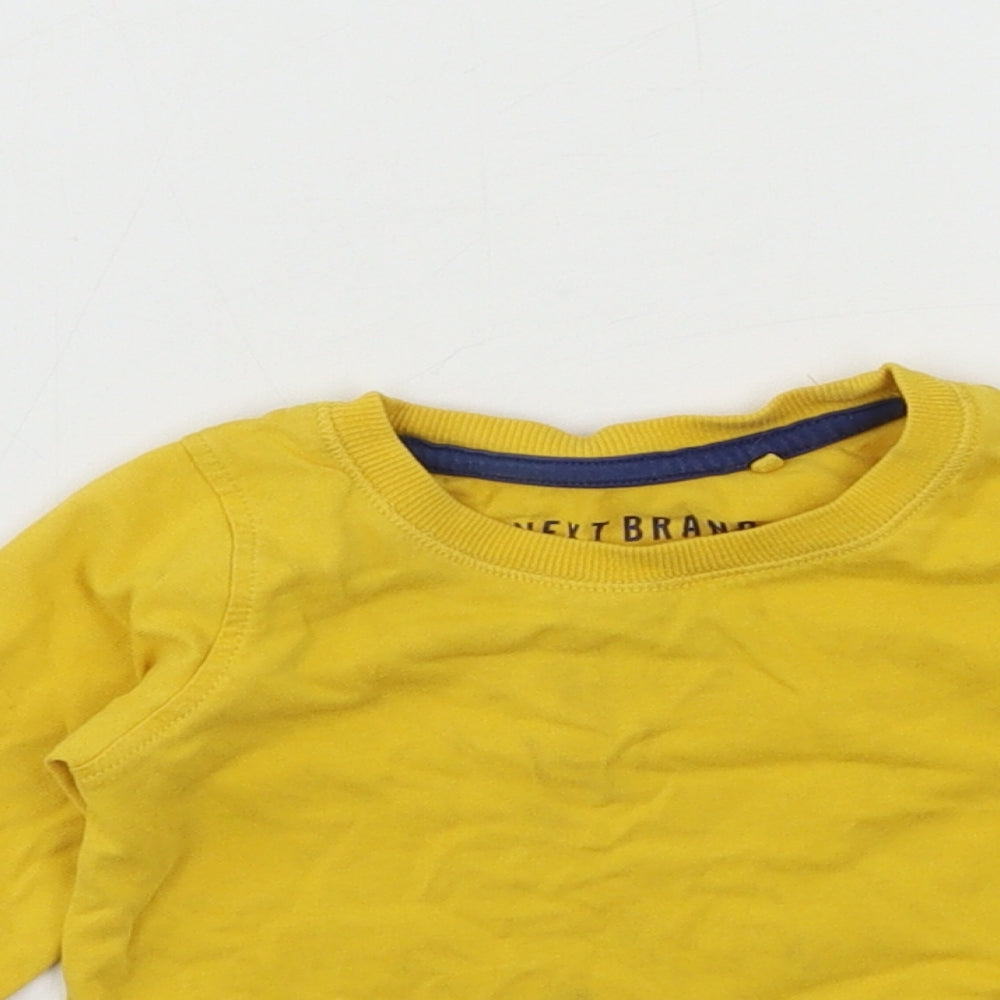 Close-up detail of Next boys’ yellow jersey basic t-shirt, size 3-6, months