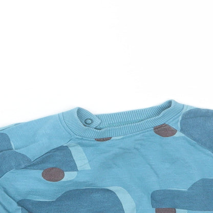 Close-up detail of Next Baby Blue jumper, size 3-6, Months