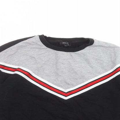 Close-up detail of New Look women’s black geometric pullover sweatshirt, size UK 10
