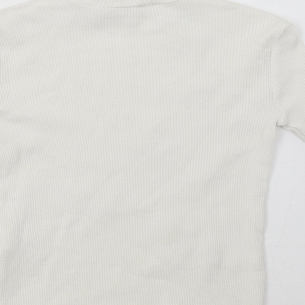 Brand and care label for Zara girls’ white pullover sweatshirt, size 6, years