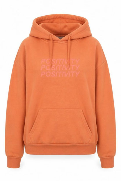 Front view of Primark women’s orange pullover hoodie, size XS