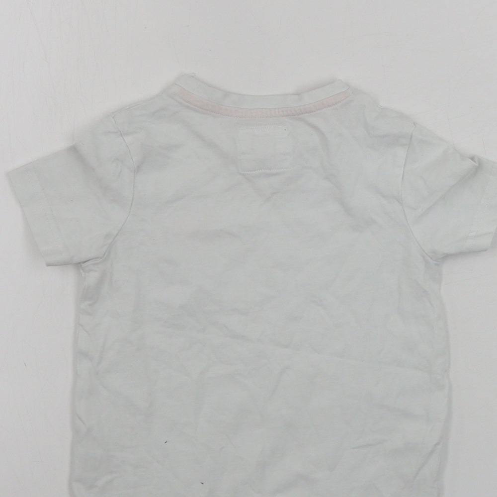 Brand and care label for Tu boys’ white basic t-shirt, size 2, years