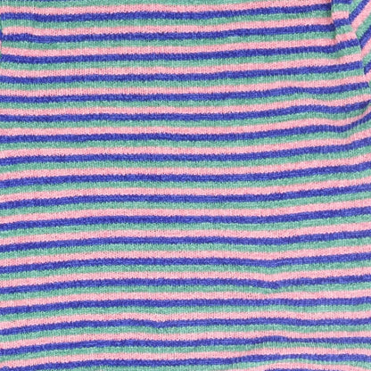 Brand and care label for Berksha girls’ blue striped jumper, size M