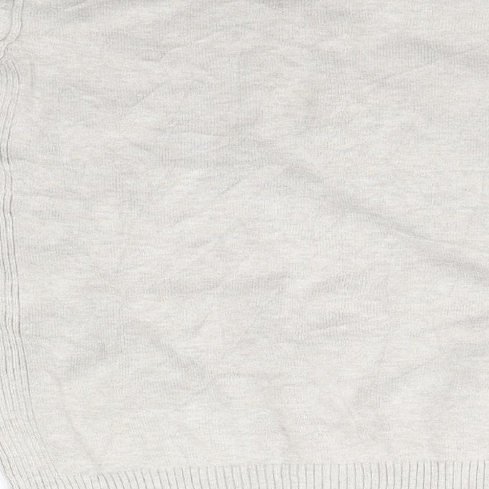 Brand and care label for Next girls’ beige jumper, size 10, years