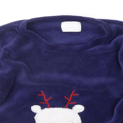 Close-up detail of Matalan girls’ blue solid top pyjama top, size S, - christmas
