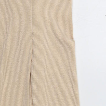 Close-up detail of PRETTYLITTLETHING women’s beige lounge pants, size UK 10