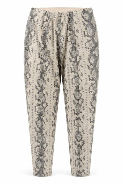 Front view of Primark women’s multicoloured animal print jegging trousers, size UK 14, 27-inch leg