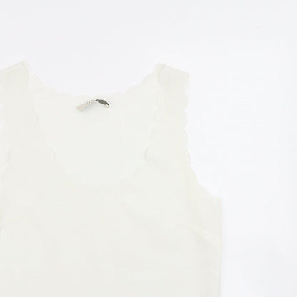 Close-up detail of OPasis women’s ivory basic blouse, size UK 10, - scalloped hem