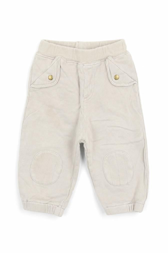 Front view of Next Baby Beige Jogger Trousers, size 9, Months