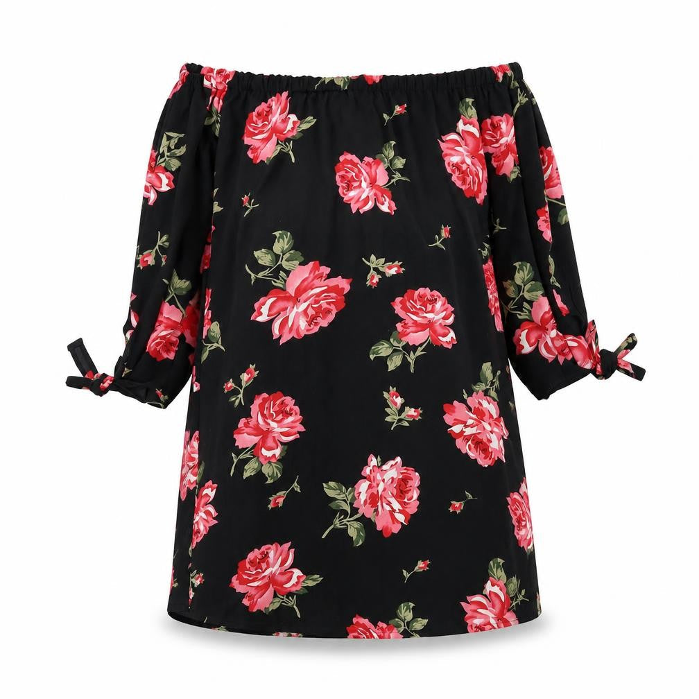 Front view of Cameo Rose women’s black floral a-line, size UK 10