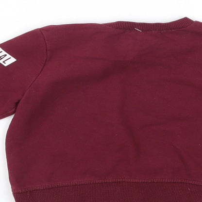 Brand and care label for M Baby Red jumper, size 6-9, Months
