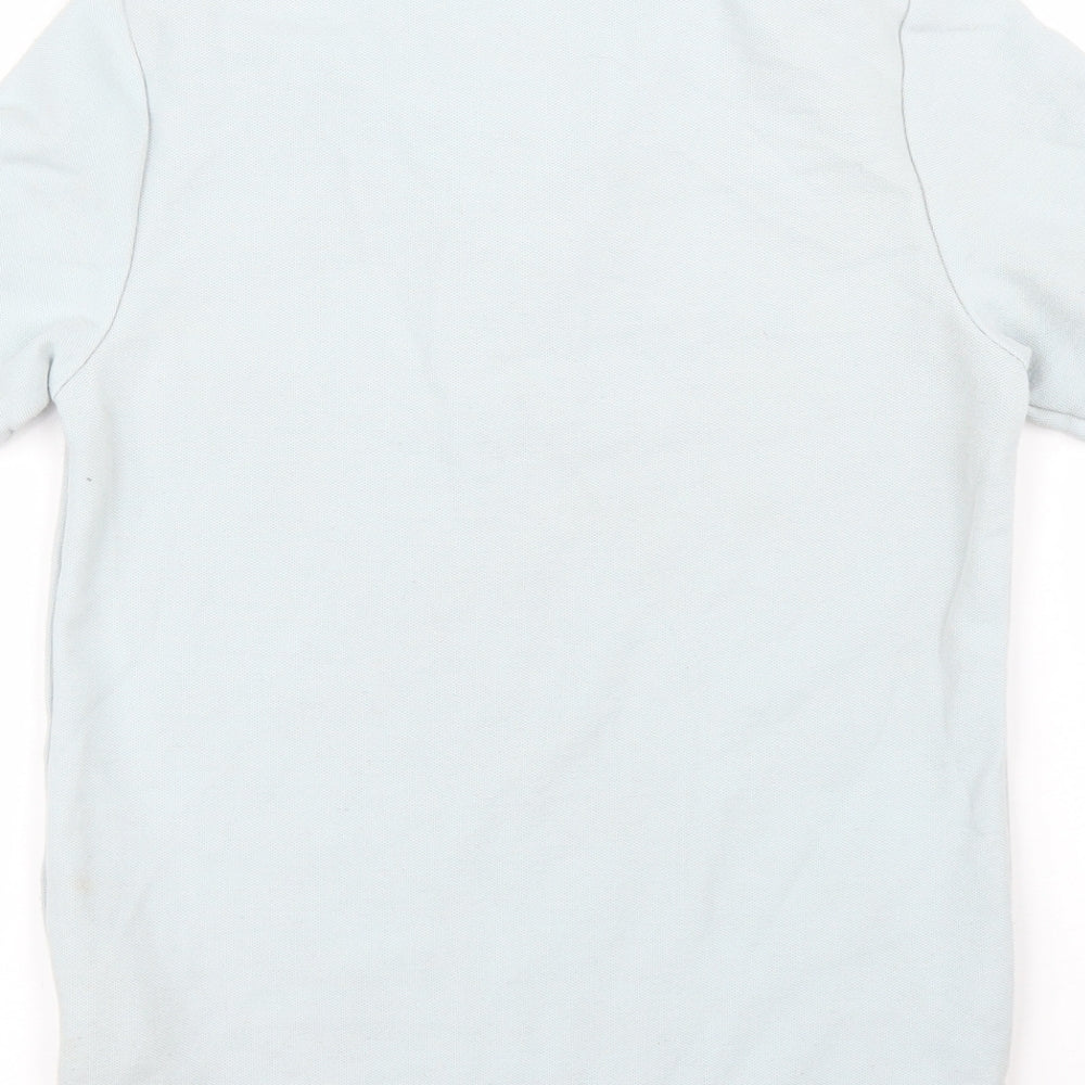 Brand and care label for Slazenger boys’ blue basic polo, size 7, years