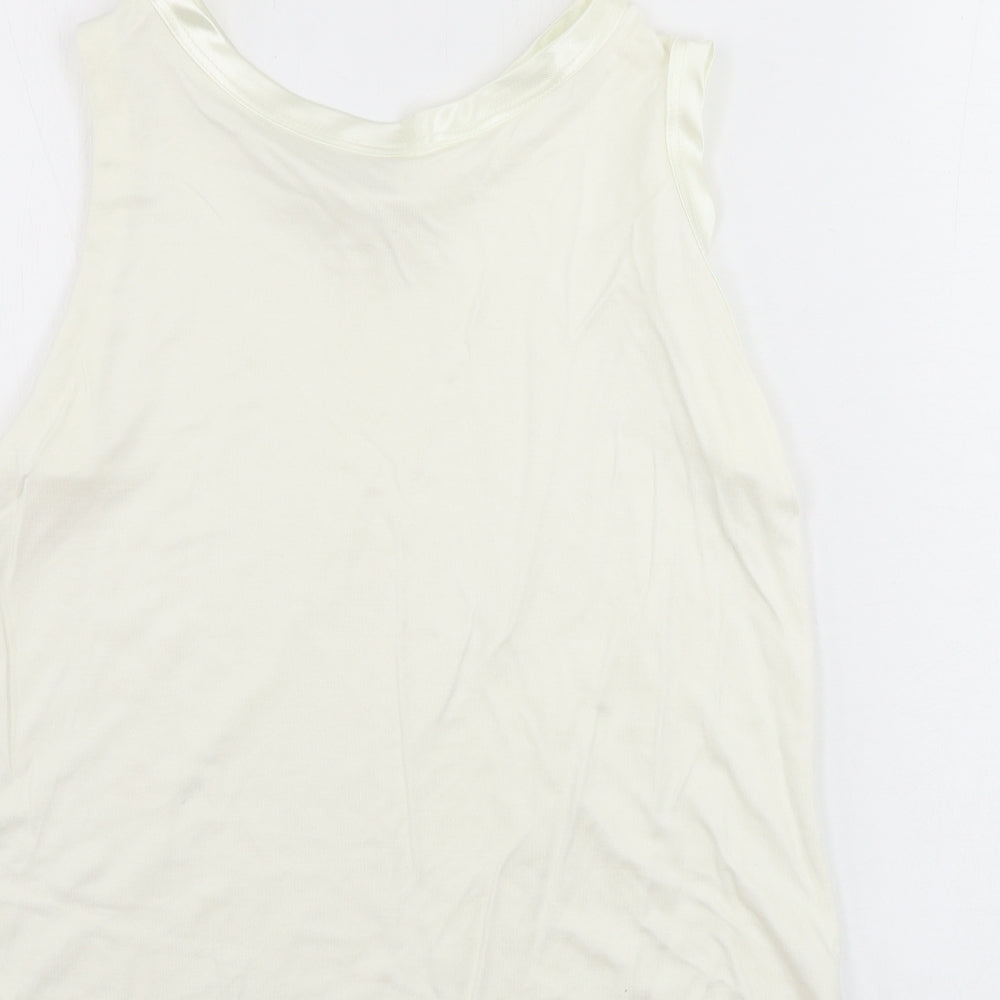 Brand and care label for Essentials look women’s ivory basic tank, size M