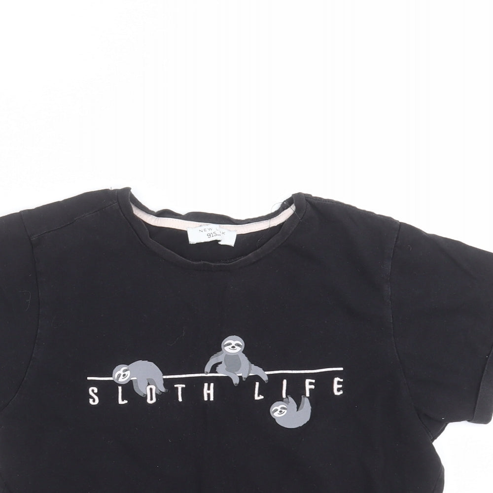 Close-up detail of New Look girls’ black basic t-shirt, size M, - sloth