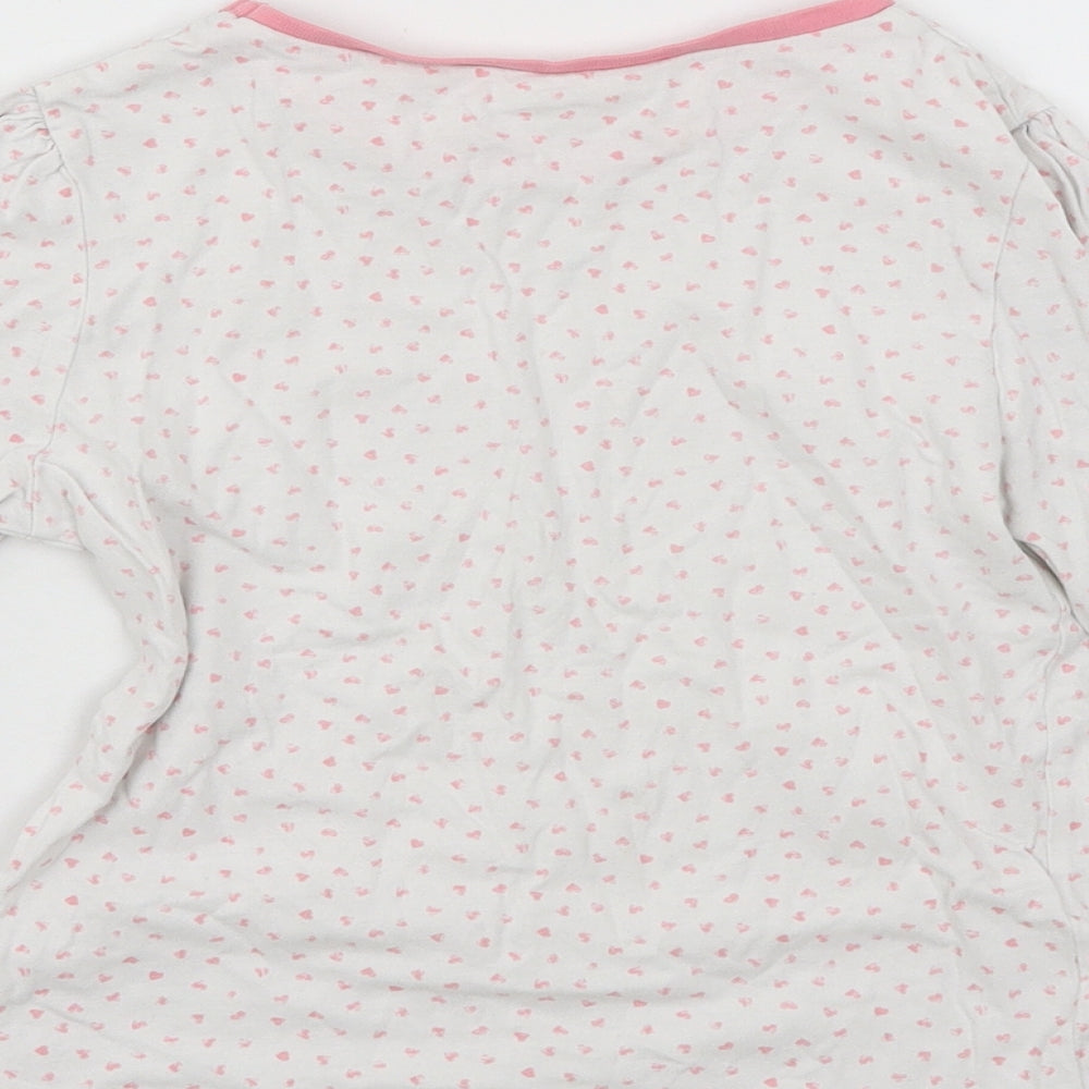 Brand and care label for George girls’ white spotted basic t-shirt, size 6-7, years