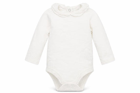 Front view of Tu girls’ white babygrow one-piece, size 3-6, months