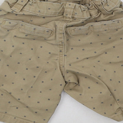 Brand and care label for Primark boys’ beige trousers, size 2-3, years
