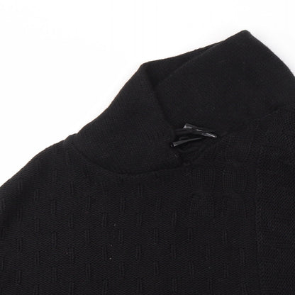 Close-up detail of b. young women’s black shrug jumper one size