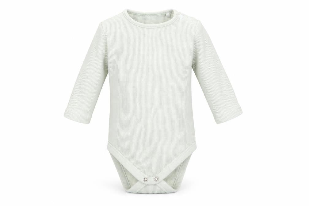 Front view of Tu girls’ green romper one-piece, size 3-6, months
