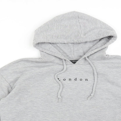 Close-up detail of Primark women’s grey pullover hoodie, size S, - london