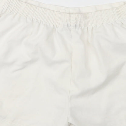 Brand and care label for Olympus women’s white cargo shorts, size XL