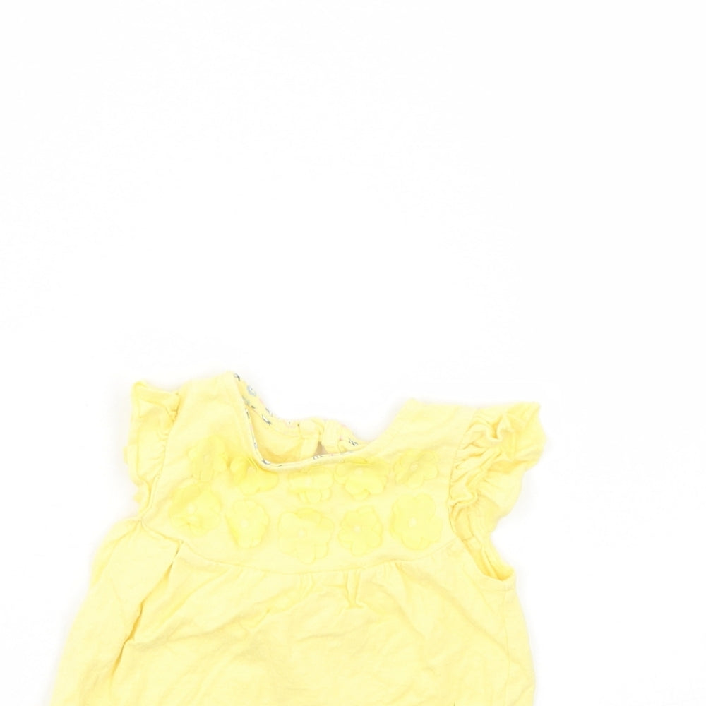 Close-up detail of F&F girls’ yellow basic blouse, size 0-3, months