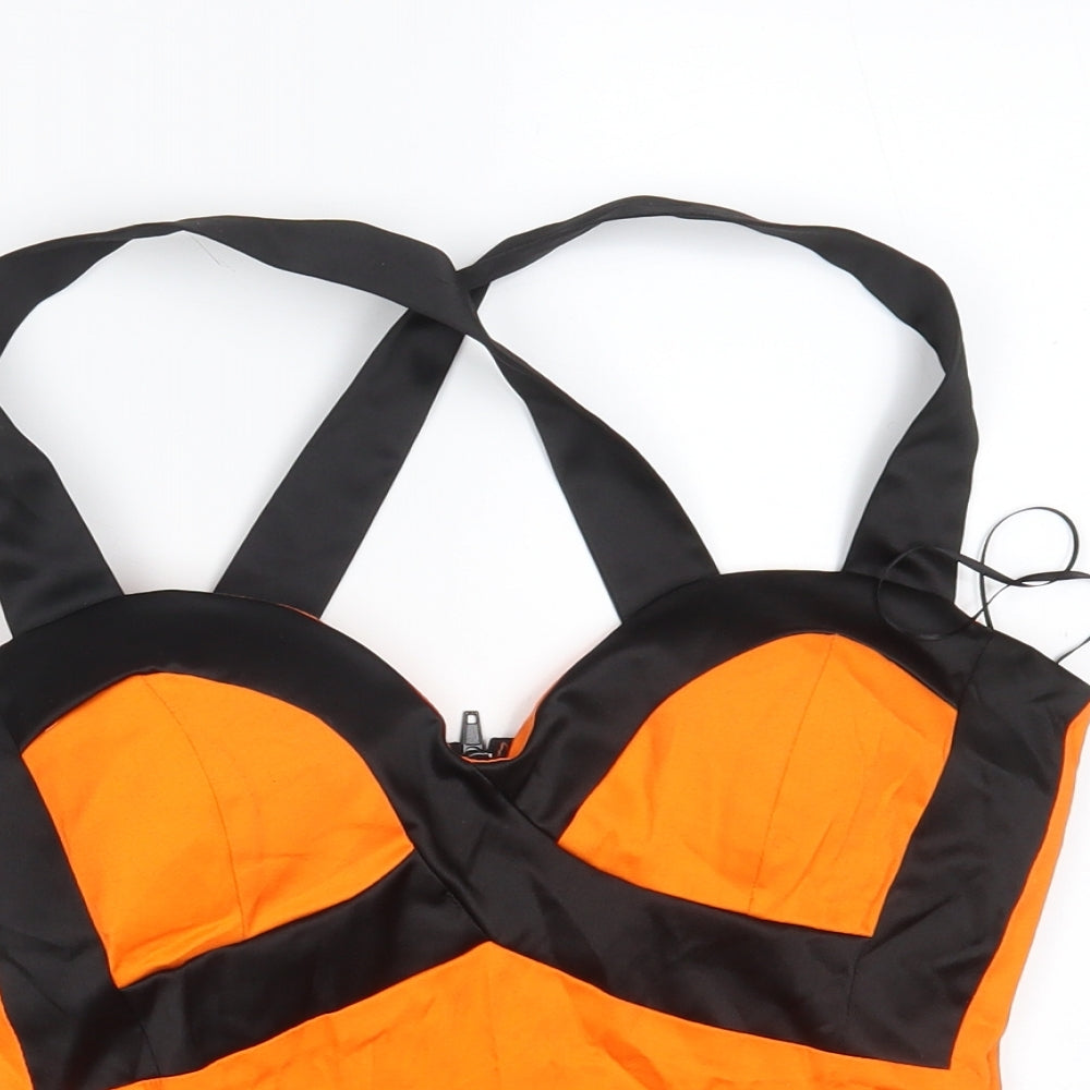 Close-up detail of Ikon women’s orange cropped tank, size UK 10