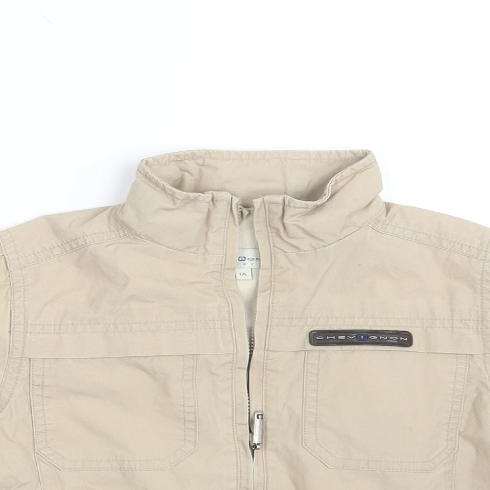 Close-up detail of Chevognon boys’ beige jacket, size 12, months