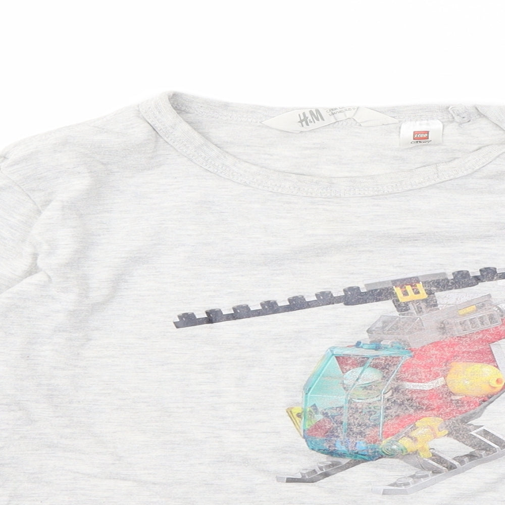 Close-up detail of H&M boys’ grey geometric basic t-shirt, size 9, years