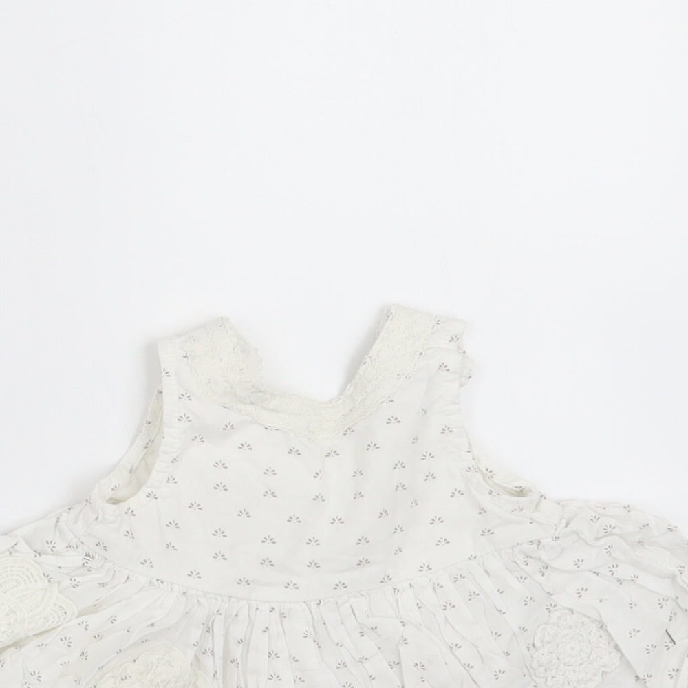Close-up detail of Next girls’ white floral basic blouse, size 3-6, months