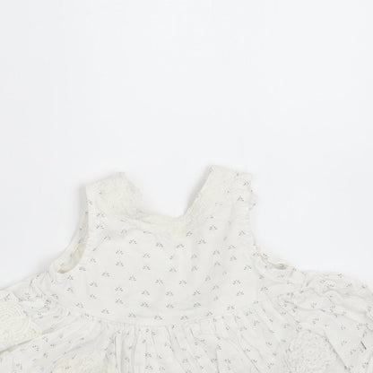 Close-up detail of Next girls’ white floral basic blouse, size 3-6, months