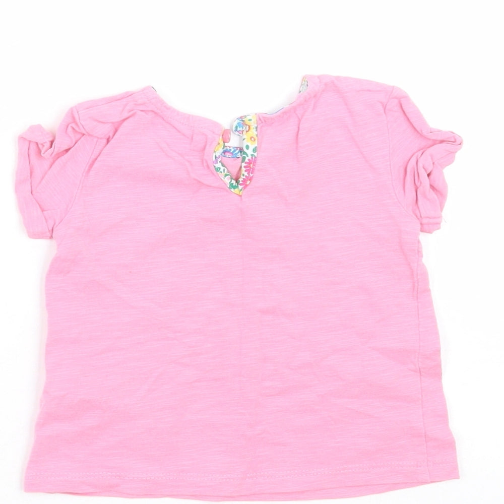 Brand and care label for Next girls’ pink basic t-shirt, size 3-6, months - floral pocket pattern