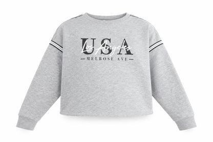 Front view of Primark girls’ grey pullover sweatshirt, size 9-10, years - usa los angeles