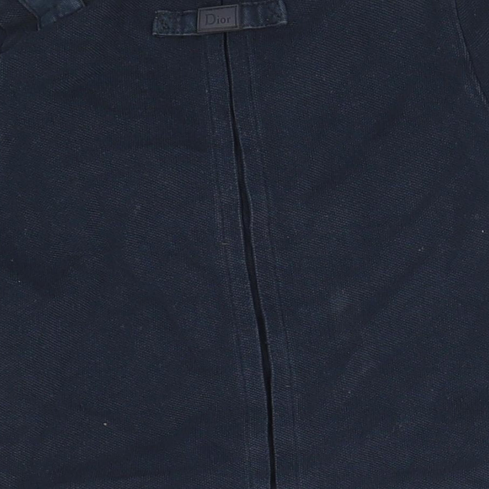 Brand and care label for Preworn Baby Blue Basic Polo, size 12, Months