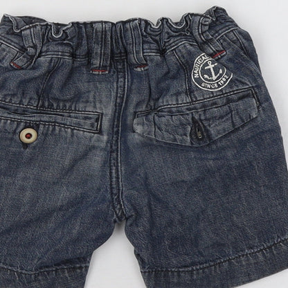 Brand and care label for Next boys’ blue cargo shorts, size 3, years