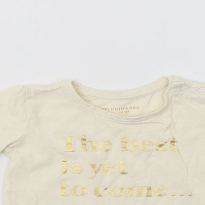 Close-up detail of Primark Baby Ivory Basic T-Shirt, size 6-9, Months
