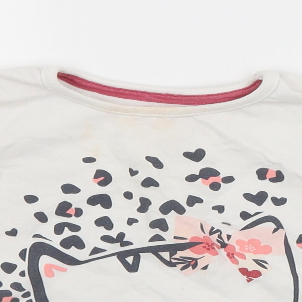Close-up detail of LULLABY girls’ white basic t-shirt, size 6-9, months