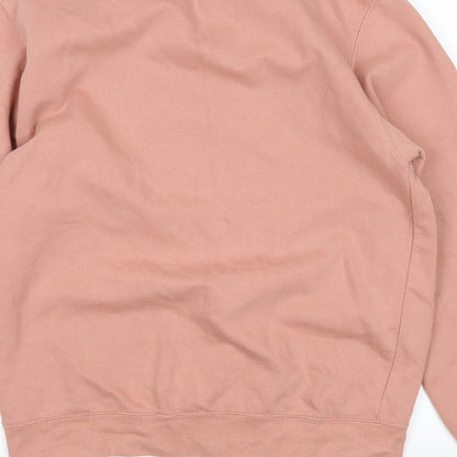 Brand and care label for women’s pink pullover sweatshirt, size S