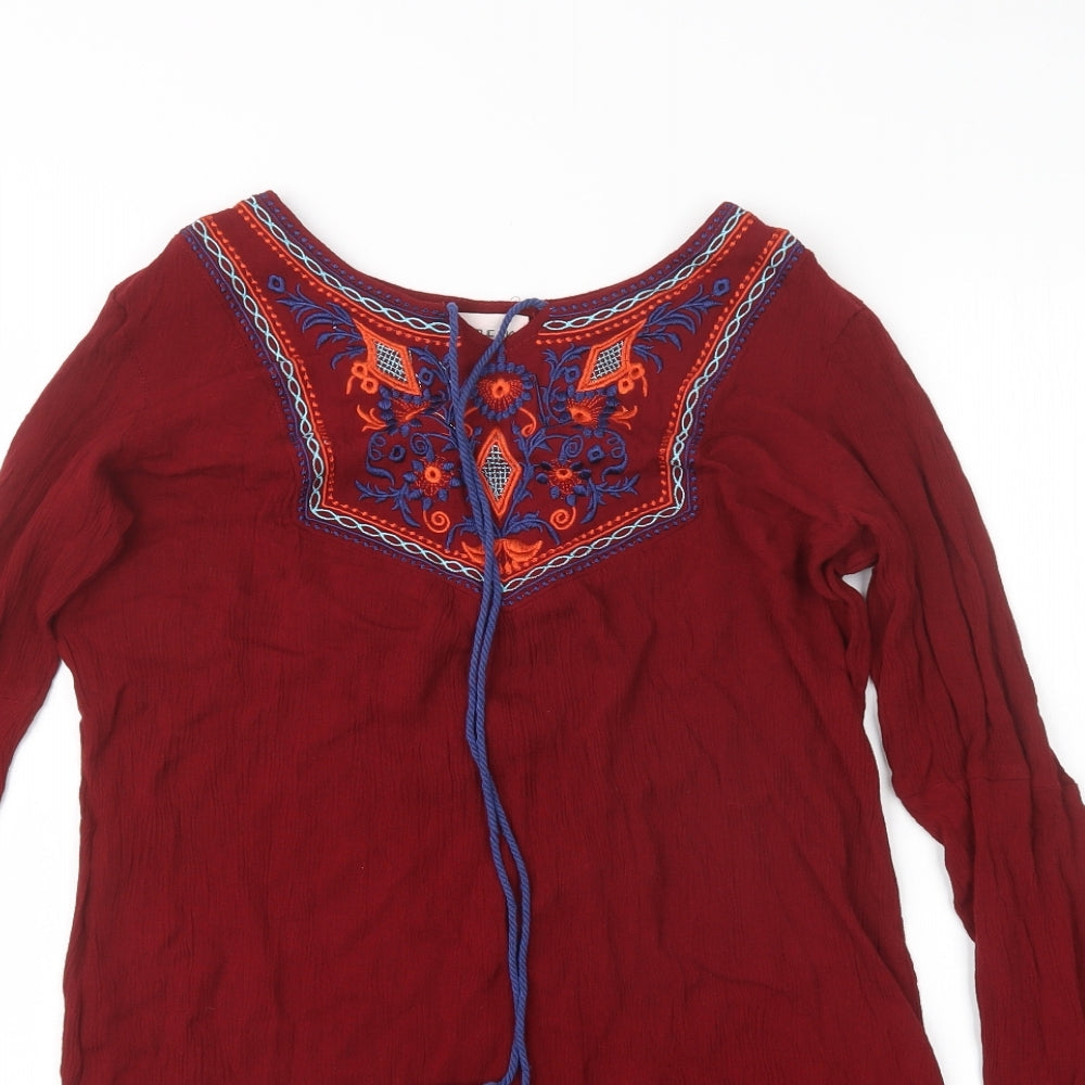 Close-up detail of Kiss the Sky women’s red basic blouse, size XS