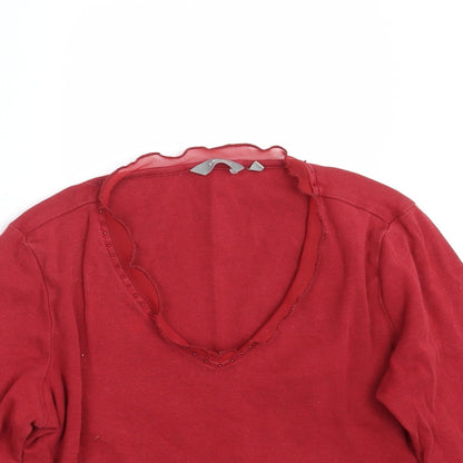 Close-up detail of Per Una women’s red pullover sweatshirt, size UK 12