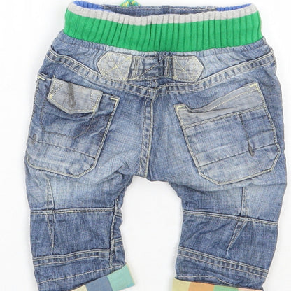 Brand and care label for Next boys’ blue cargo jeans, size 3-6, months