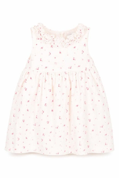 Front view of Mini Club girls’ white floral a-line, size 9-12, months