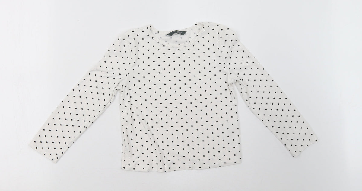 Front view of Primark girls’ white polka dot pullover sweatshirt, size 7-8, years